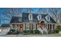 Charming brick home with a landscaped yard and attached garage at 1699 Yorkshire Ln, Rocky Mount, NC 27803
