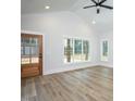 Spacious living room with hardwood floors, high ceilings, and large windows at 4120 Emily Ln, Oxford, NC 27565