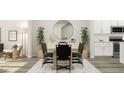 Elegant dining room with a wood table, black chairs, and a large mirror at 1848 Poe Farm Ave, Apex, NC 27502