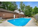 Inviting in-ground pool, great for summer fun at 200 Cedarwood Dr, Erwin, NC 28339