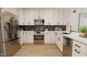 Modern kitchen with stainless steel appliances and stylish backsplash at 4075 Elk Creek Ln # 9, Raleigh, NC 27612