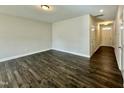 Bright living room with hardwood floors and neutral walls at 554 Eversden Dr, Zebulon, NC 27597