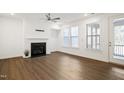 Bright living room with fireplace and hardwood floors at 2029 Maggie Valley Dr, Apex, NC 27502