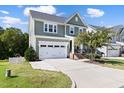 Two-story craftsman home with driveway and attached garage at 296 Two Creeks Lp, Chapel Hill, NC 27517