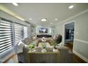 Spacious living room with sectional sofa and fireplace at 101 Oakmont Ave, Durham, NC 27713