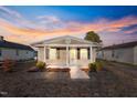 Charming single story home with front porch at 408 W Main St, Pine Level, NC 27568