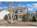 Two-story house with stone and siding, two-car garage, and driveway at 664 Long Melford Dr, Rolesville, NC 27571