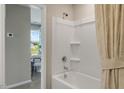 Bathroom with shower/tub combo and access to another room at 104 Kobus Ct, Garner, NC 27529