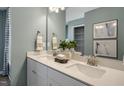 Spa-like bathroom with double vanity, updated fixtures, and a relaxing atmosphere at 119 Siebold St, Garner, NC 27529