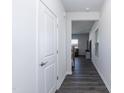 Hallway with door to living area, and stairs at 1388 Fruit Cobbler Dr, Haw River, NC 27258