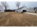 New construction home with attached garage and side yard at 7335 Pilatus Ave, Spring Hope, NC 27882