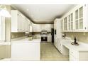 Kitchen boasts ample cabinetry, stainless steel appliances, and an island at 805 Joshua Clay Dr, Rocky Mount, NC 27803