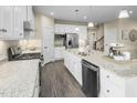 Modern kitchen with stainless steel appliances and granite countertops at 1008 Country Pasture Cv, Wendell, NC 27591