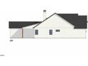 Left side view of house with covered porch at 2952 Forest Creek Ln, Mebane, NC 27302