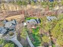 Luxury home nestled in a wooded neighborhood near golf course at 302 Champions Point Way, Cary, NC 27513
