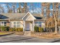 Inviting single-story home with light yellow siding, white trim, manicured landscaping, and cozy residential charm at 3727 Votive Ln, Raleigh, NC 27604