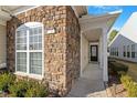 Front entrance with stone detailing and a walkway at 755 Finnbar Dr, Cary, NC 27519