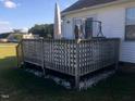 Wooden deck with lattice panels in the backyard of a home at 288 Rosa Cir, Willow Springs, NC 27592