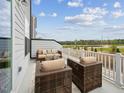 Relaxing outdoor patio with comfortable seating and scenic views at 524 Billingshurst Way, Knightdale, NC 27545