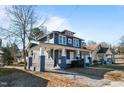 Two-story Craftsman home with gray siding, white trim, and a front porch at 835 Sunset Ave, Rocky Mount, NC 27804