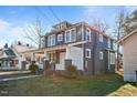 Two-story Craftsman home with gray siding, white trim, and a front porch at 835 Sunset Ave, Rocky Mount, NC 27804