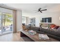 Spacious living room with access to backyard patio and golf course views at 871 Parc Townes Dr # 1, Wendell, NC 27591