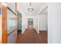 Bright entryway with hardwood floors and a view into the living area at 126 Sanderway Dr, Chapel Hill, NC 27516