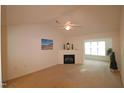 Spacious living room featuring a fireplace and vaulted ceiling at 2530 Friedland Pl # 104, Raleigh, NC 27617