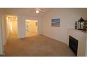 Spacious living area with views into kitchen and hallway at 2530 Friedland Pl # 104, Raleigh, NC 27617