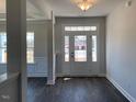 Bright entryway with hardwood floors and view of front door at 55 Watermelon Dr, Franklinton, NC 27525