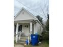 House exterior showing side view, needs yard work at 1103 E Lane St, Raleigh, NC 27601