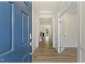 Bright and spacious foyer with hardwood floors and a view to the living area at 72 Demascus Way, Four Oaks, NC 27524