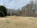 Open land with shed and trees at 852 Old Stage S Rd, Erwin, NC 28339