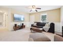 Relaxing living room with a large TV and comfortable seating at 105 N Bend Dr, Knightdale, NC 27545