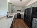 Modern kitchen with stainless steel appliances and quartz countertops at 2106 Pathway Dr, Chapel Hill, NC 27516