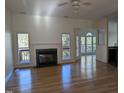 Spacious living room with hardwood floors and fireplace at 2106 Pathway Dr, Chapel Hill, NC 27516