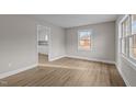 Bright and airy living room with hardwood floors and ample natural light at 302 Ellen Dr, Knightdale, NC 27545