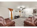 Spacious living room features hard surface flooring, and natural light at 3928 Mike Levi Ct, Raleigh, NC 27610