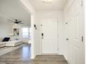 Bright entryway with hardwood floors, leading to a living area at 601 Joe Gibson Dr, Gibsonville, NC 27249