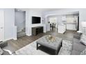 Spacious living room featuring hardwood floors and ample natural light at 816 Bright Nova Way, Wendell, NC 27591
