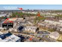 Aerial view of the community highlighting proximity to North Hills, Crabtree Creek Trail, and Raleigh Midtown Shopping at 2621 Oldgate Dr # 105, Raleigh, NC 27604