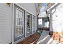 Home features gray siding, brick accents, and a walkway at 316 Trappers Run Dr, Cary, NC 27513
