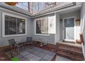 Cozy patio with brick flooring and comfortable seating at 316 Trappers Run Dr, Cary, NC 27513