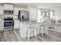 Modern kitchen with stainless steel appliances and an island at 38 Brazan Ct, Fuquay Varina, NC 27526
