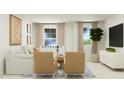 Relaxing sitting room with a sofa and two armchairs at 609 Morning Light Dr, Angier, NC 27501