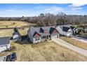 Aerial view of a house with a large backyard and surrounding land at 10080 Nc-39, Middlesex, NC 27557