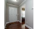 Bright entryway with hardwood floors and access to office at 332 Dove Cottage Ln, Cary, NC 27519