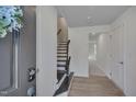 Bright entryway with stairs leading to the second floor at 445 Brier Summit Pl, Durham, NC 27703