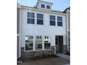 Charming new construction home with stone accents and large windows at 6330 Granite Quarry Dr, Raleigh, NC 27610