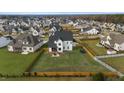 Aerial view showcasing the home's large backyard and surrounding neighborhood at 1105 Duke Farm Dr, Wake Forest, NC 27587